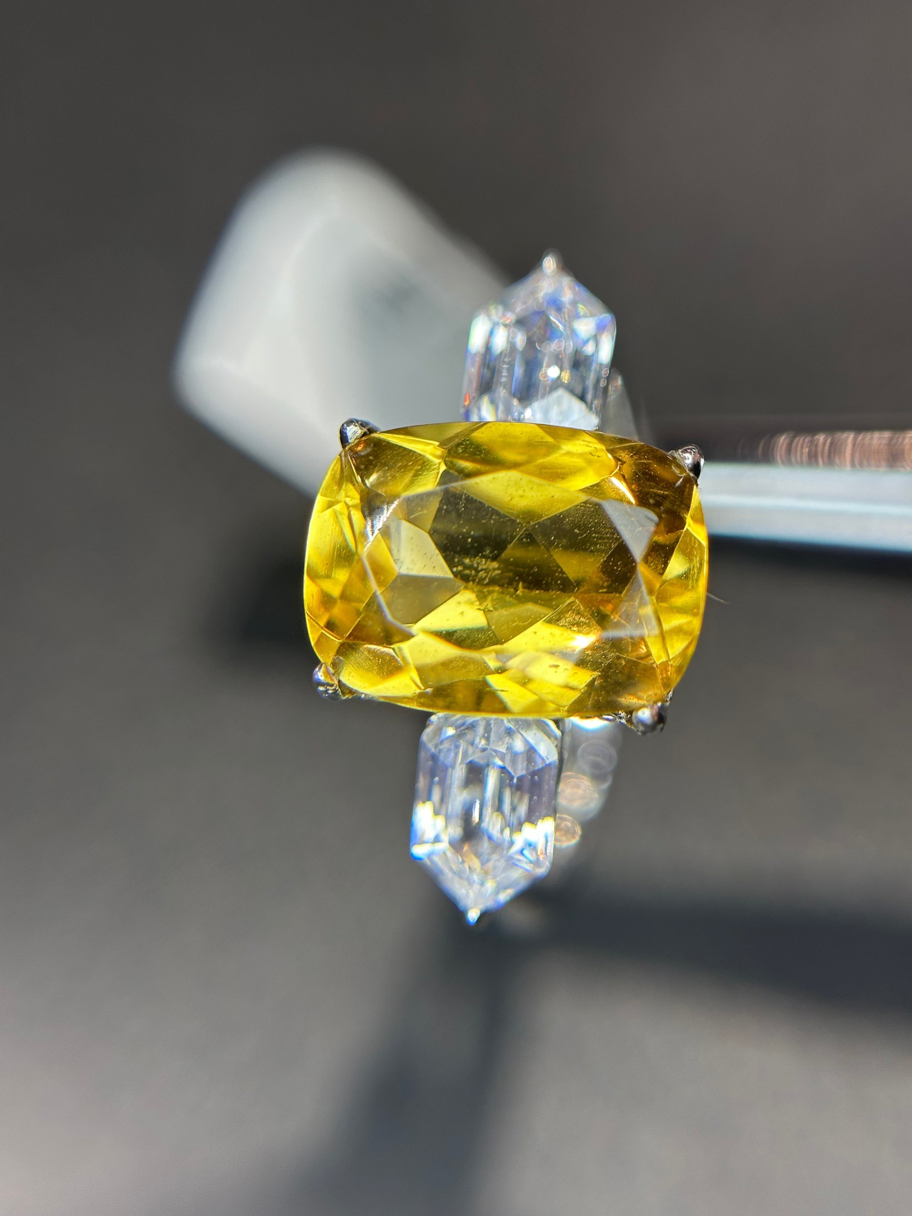 Shiza Gems golden yellow cushion-cut citrine ring with baguette accents in sterling silver.