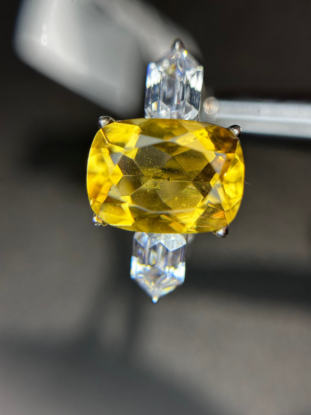 Shiza Gems golden yellow cushion-cut citrine ring with baguette accents in sterling silver.