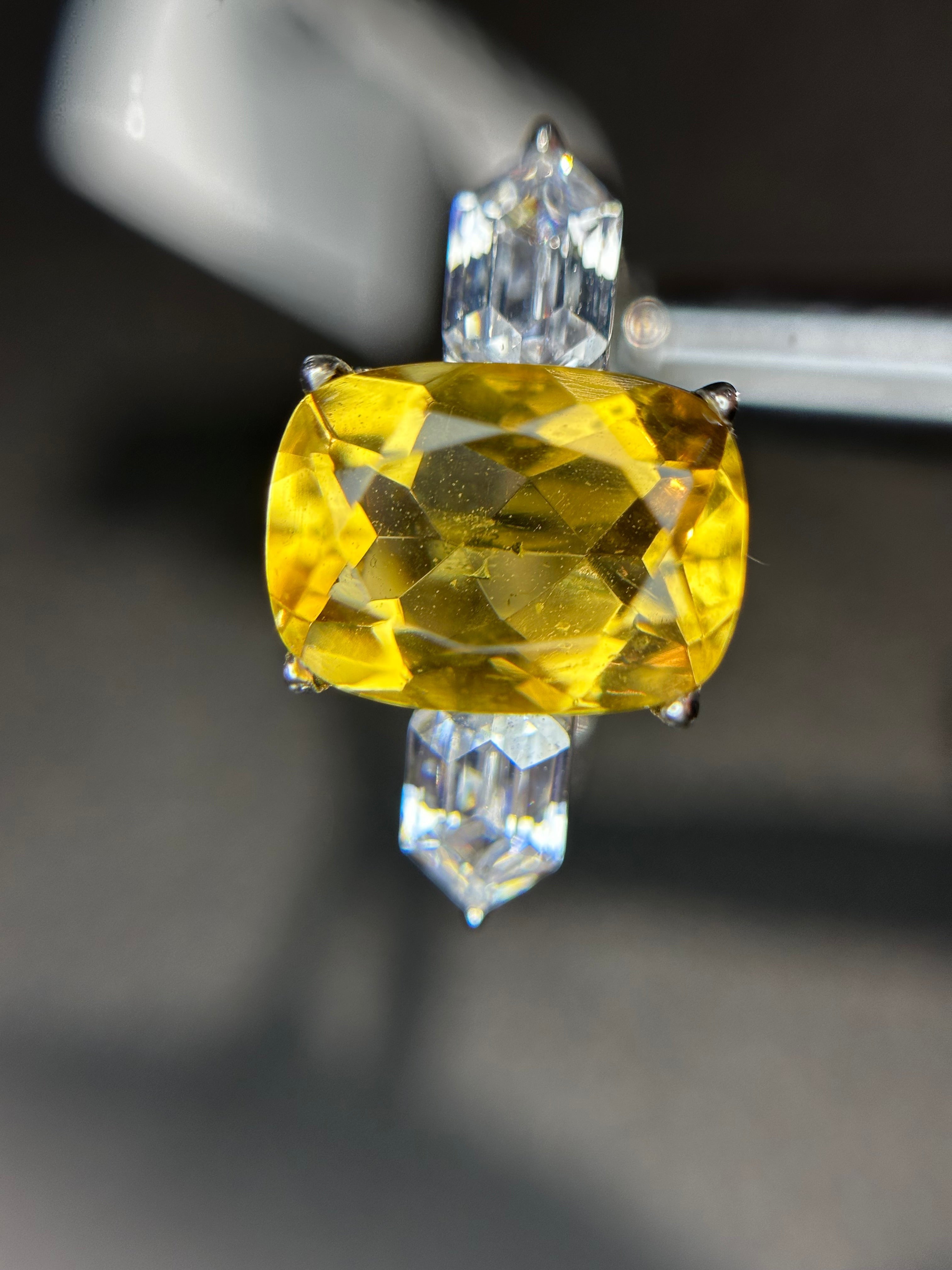 Shiza Gems golden yellow cushion-cut citrine ring with baguette accents in sterling silver.