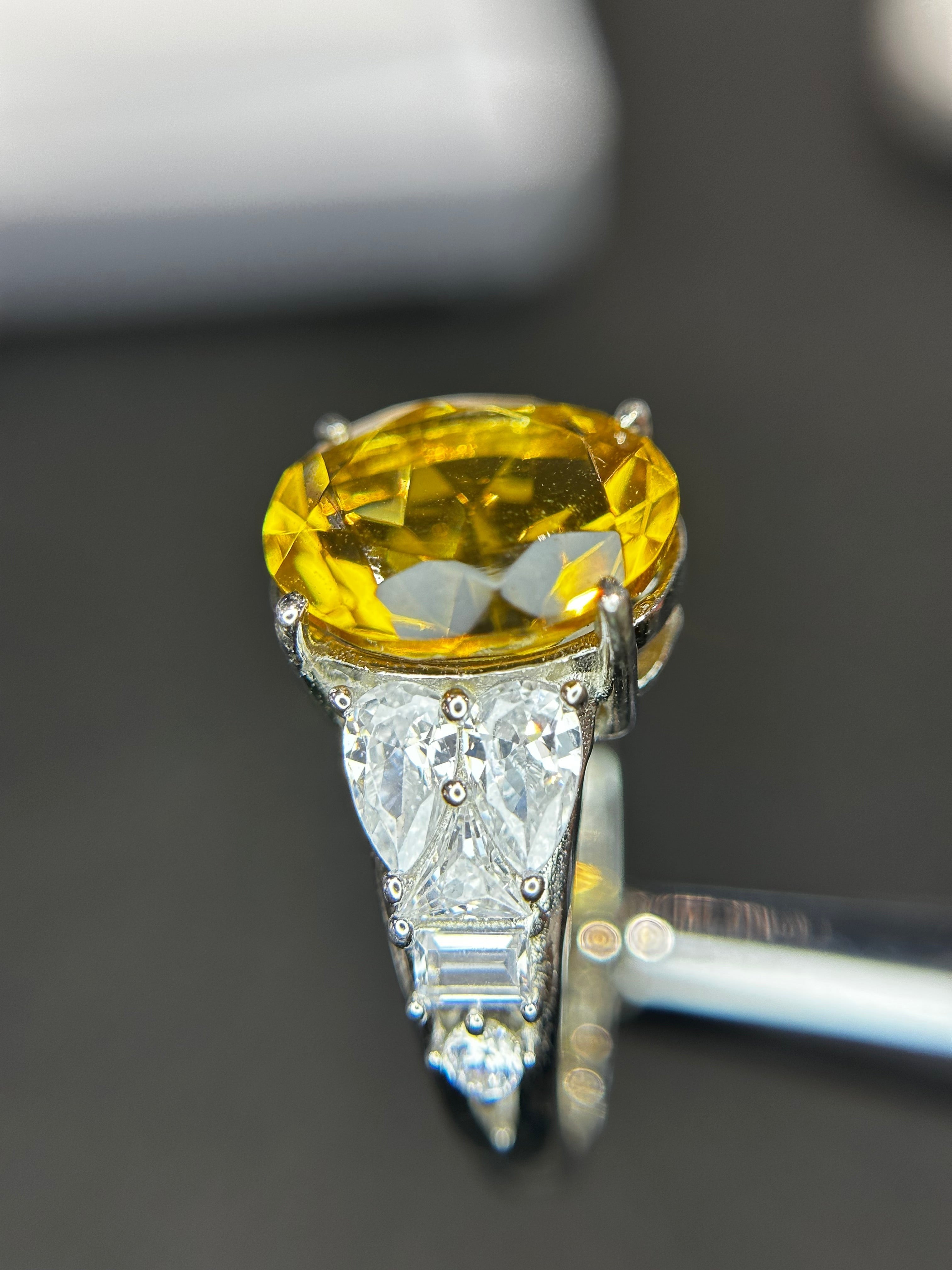 Shiza Gems large oval golden yellow citrine ring with pear-shaped accents and full pavé cubic zirconia in sterling silver.