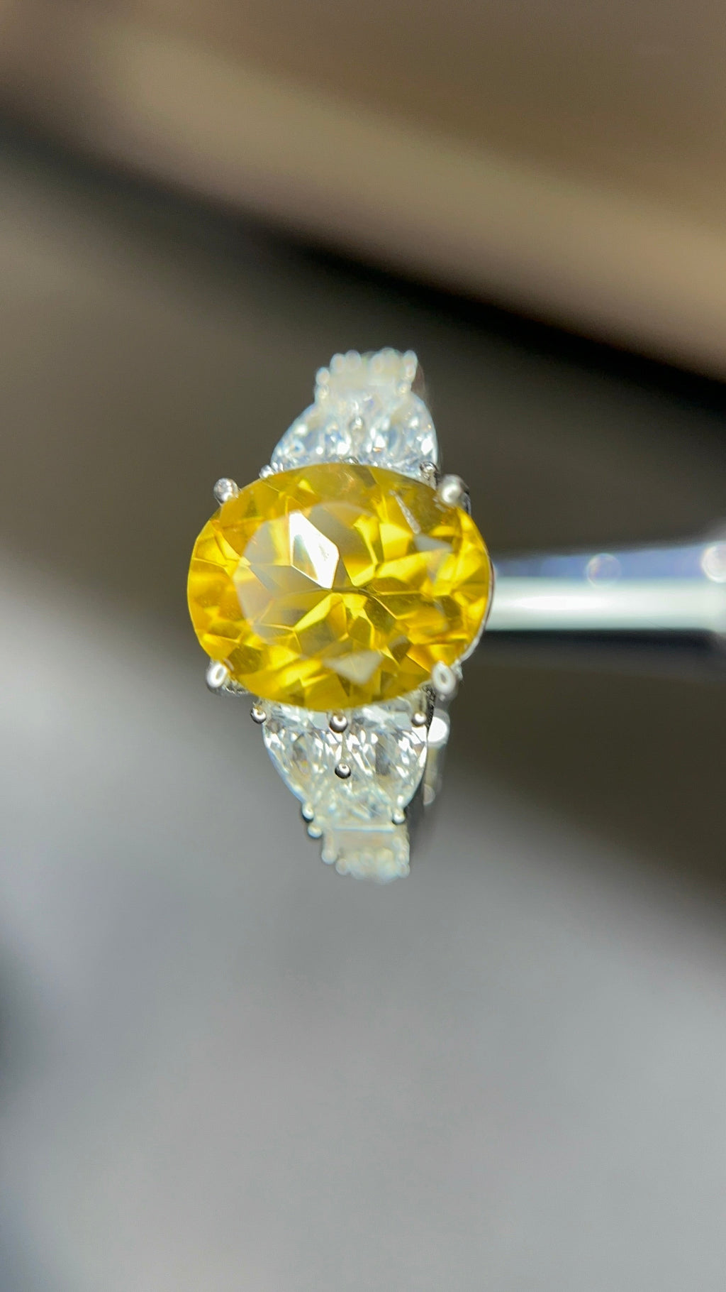 Shiza Gems large oval golden yellow citrine ring with pear-shaped accents and full pavé cubic zirconia in sterling silver.
