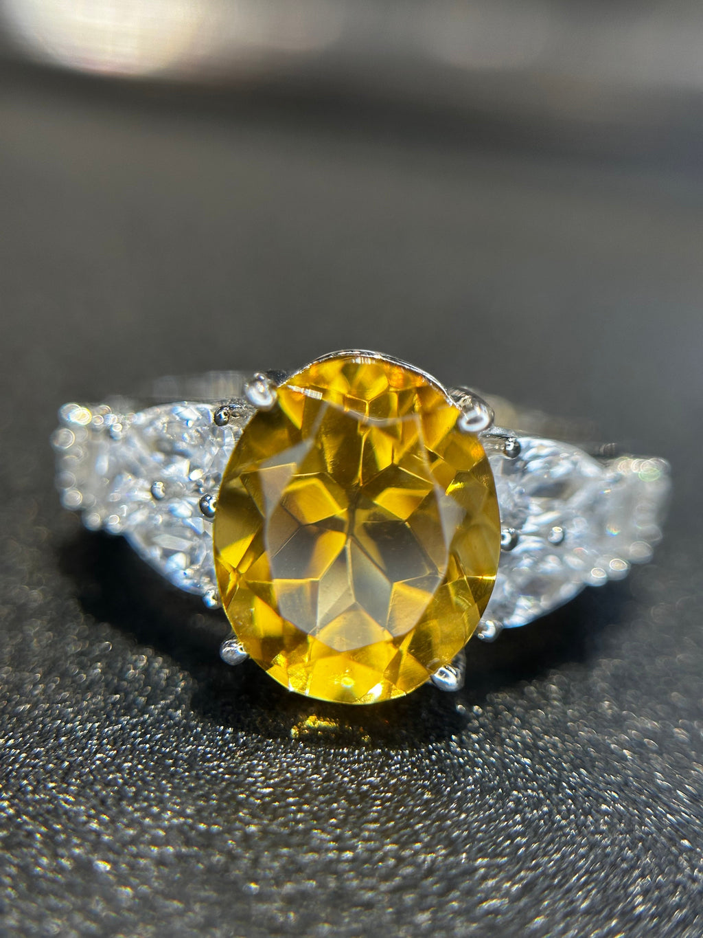 Shiza Gems large oval golden yellow citrine ring with pear-shaped accents and full pavé cubic zirconia in sterling silver.