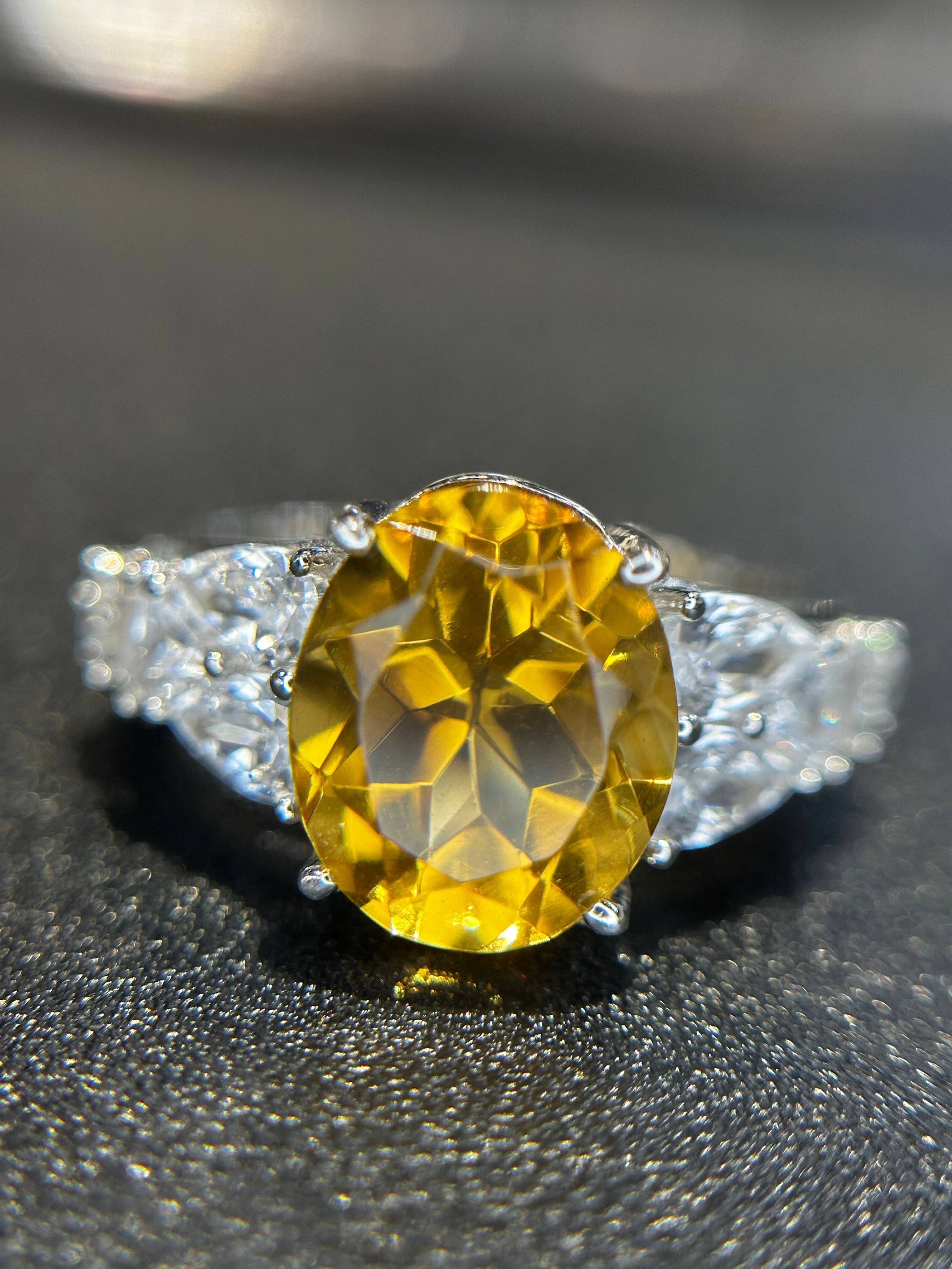 Shiza Gems large oval golden yellow citrine ring with pear-shaped accents and full pavé cubic zirconia in sterling silver.