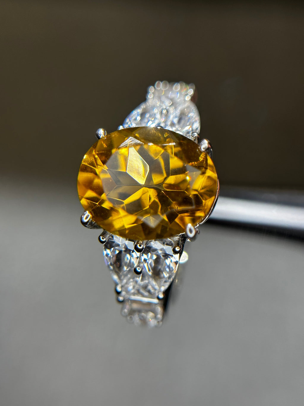 Shiza Gems oval natural citrine ring with pear-shaped accents and full pavé cubic zirconia in sterling silver.