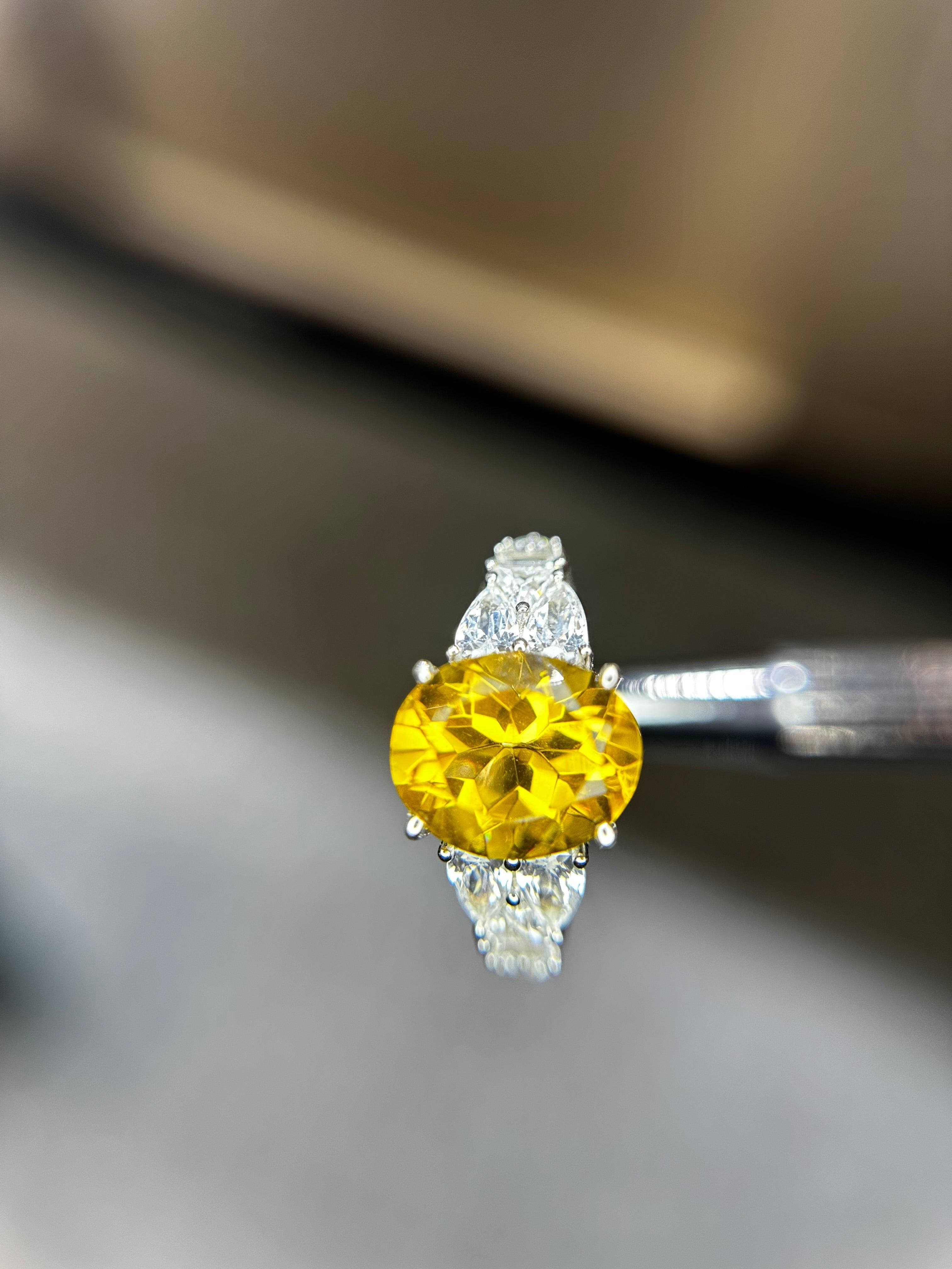 Shiza Gems large oval golden yellow citrine ring with pear accents and full pavé cubic zirconia in sterling silver.