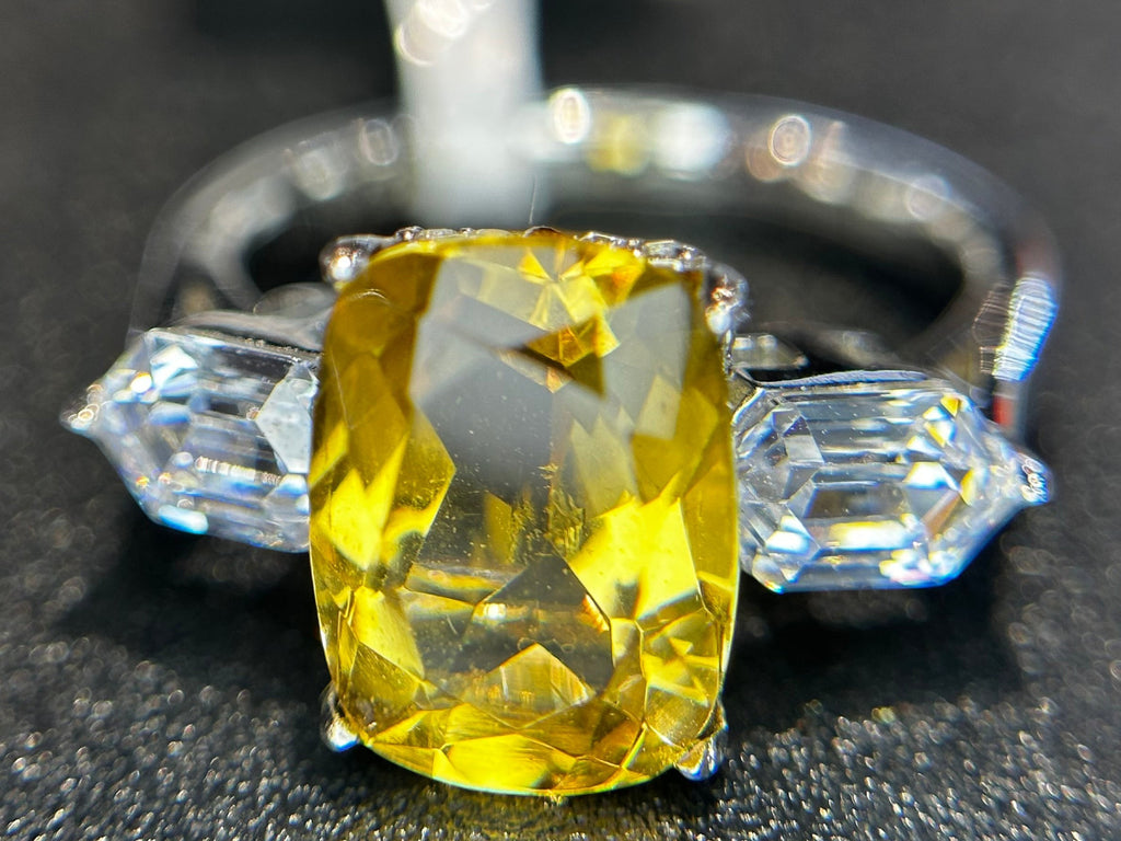 Shiza Gems natural cushion-cut golden yellow citrine ring with baguette accents in sterling silver.