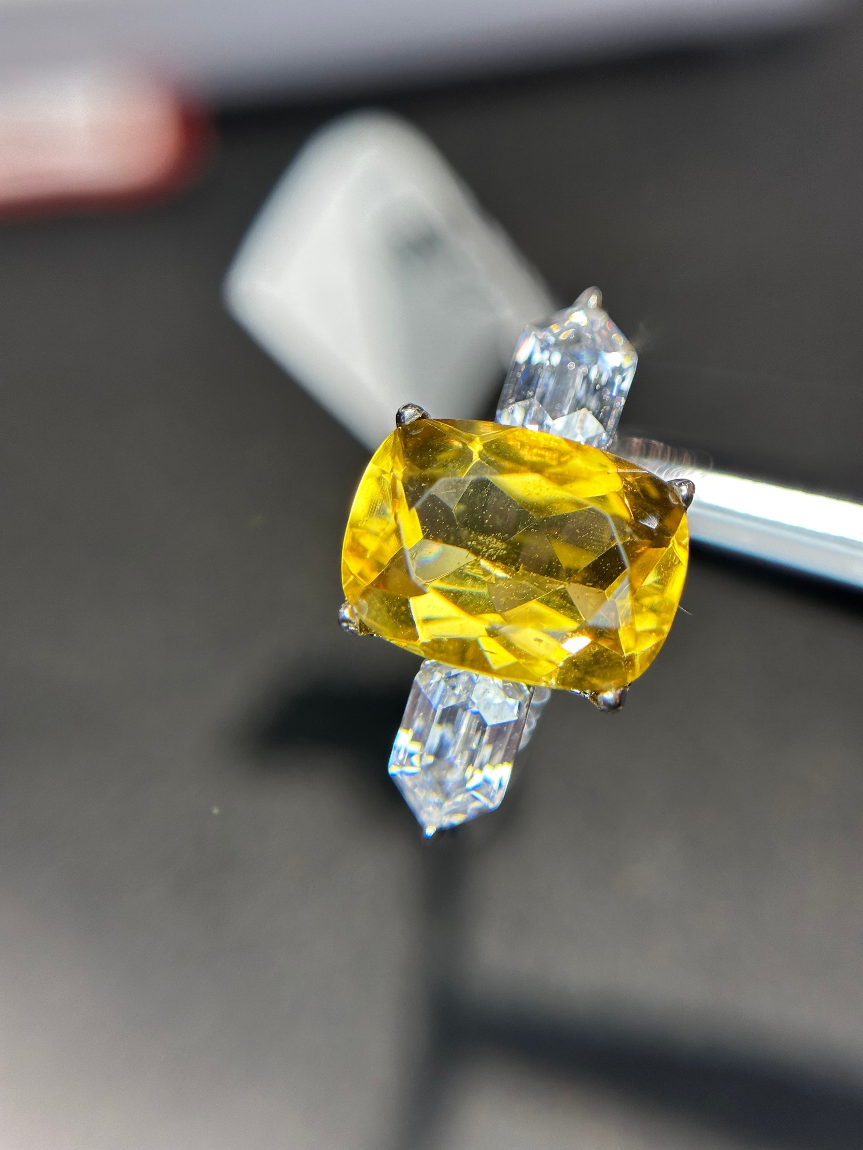 Shiza Gems golden yellow cushion-cut citrine ring with baguette accents in sterling silver.
