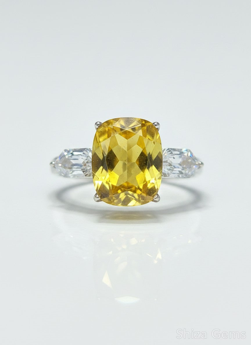 Shiza Gems large cushion-cut golden yellow citrine ring with baguette accents in sterling silver.
