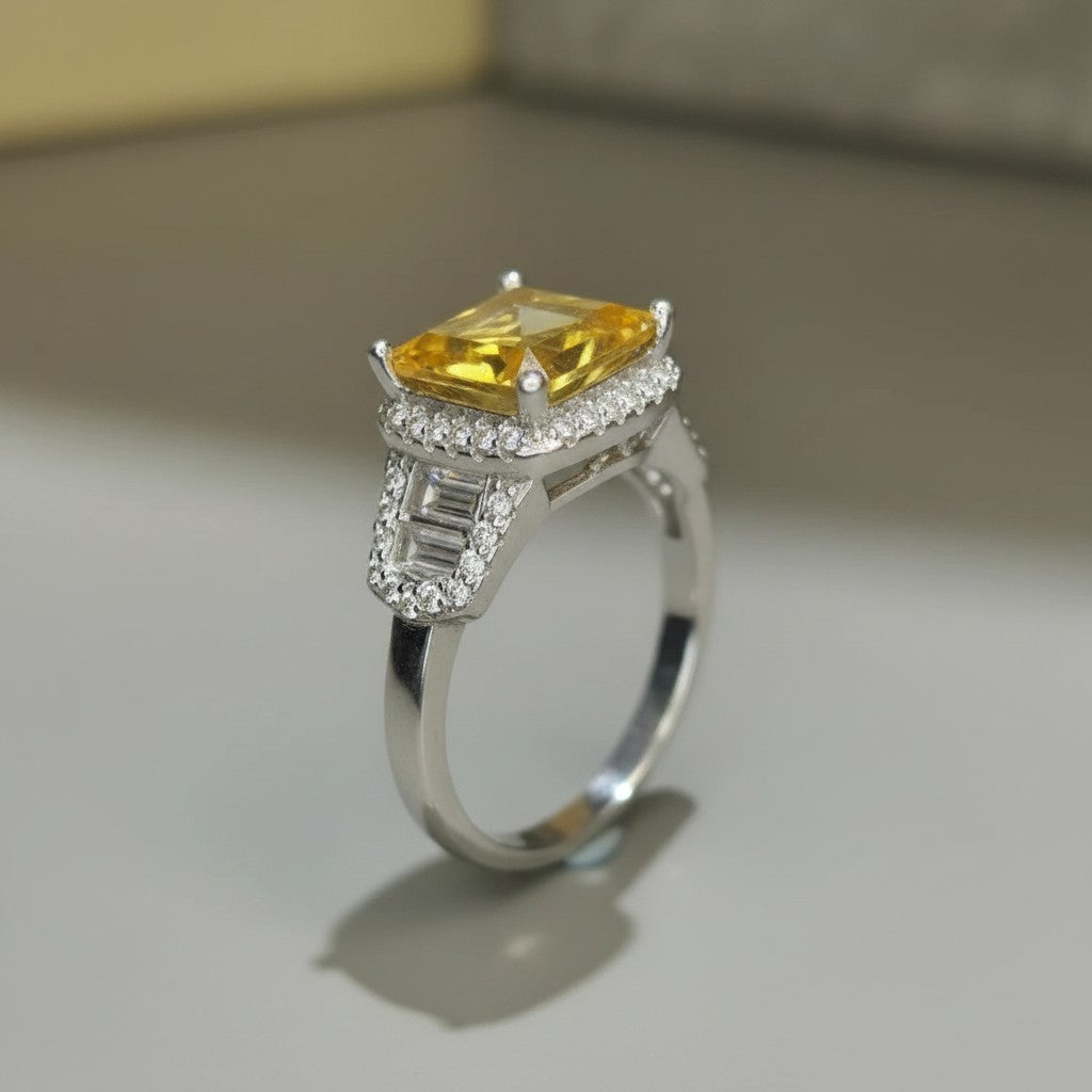 Shiza Gems natural golden-yellow emerald-cut citrine ring with double halo and baguette accents in sterling silver.