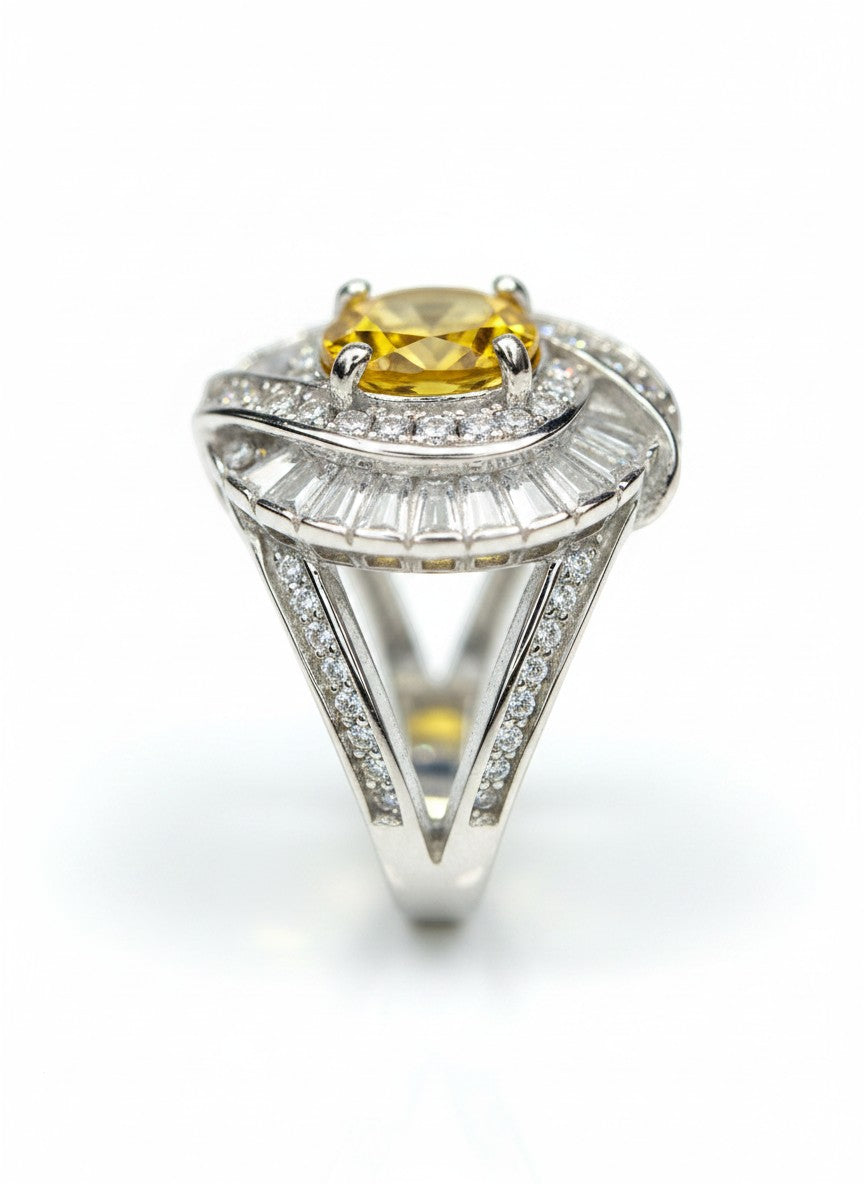 Shiza Gems large oval golden yellow citrine ring with double halo of baguette and pavé cubic zirconia in sterling silver.