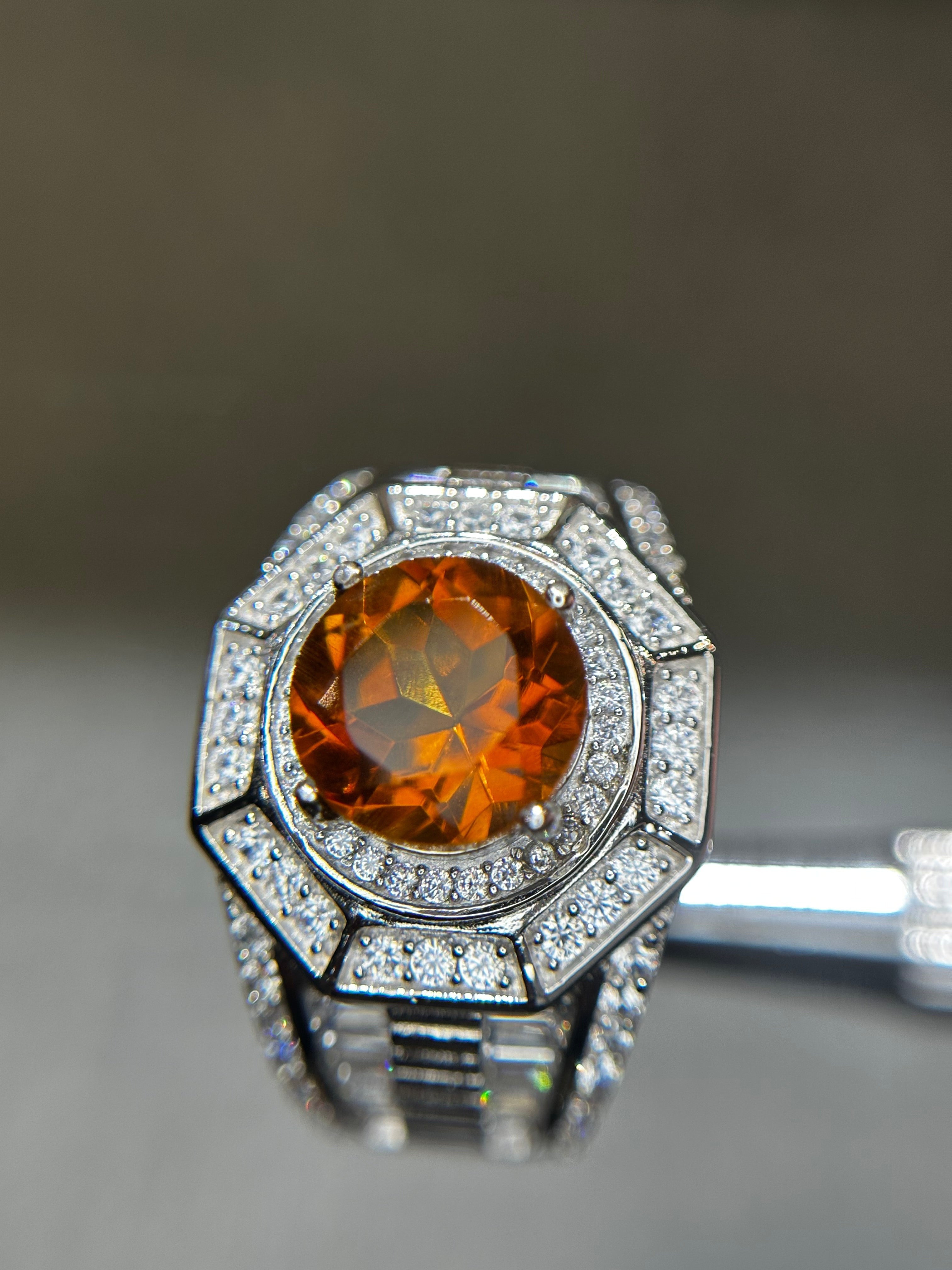 Shiza Gems men's ring with large oval golden-orange citrine, surrounded by pave CZ in sterling silver. Geometric octagonal design.