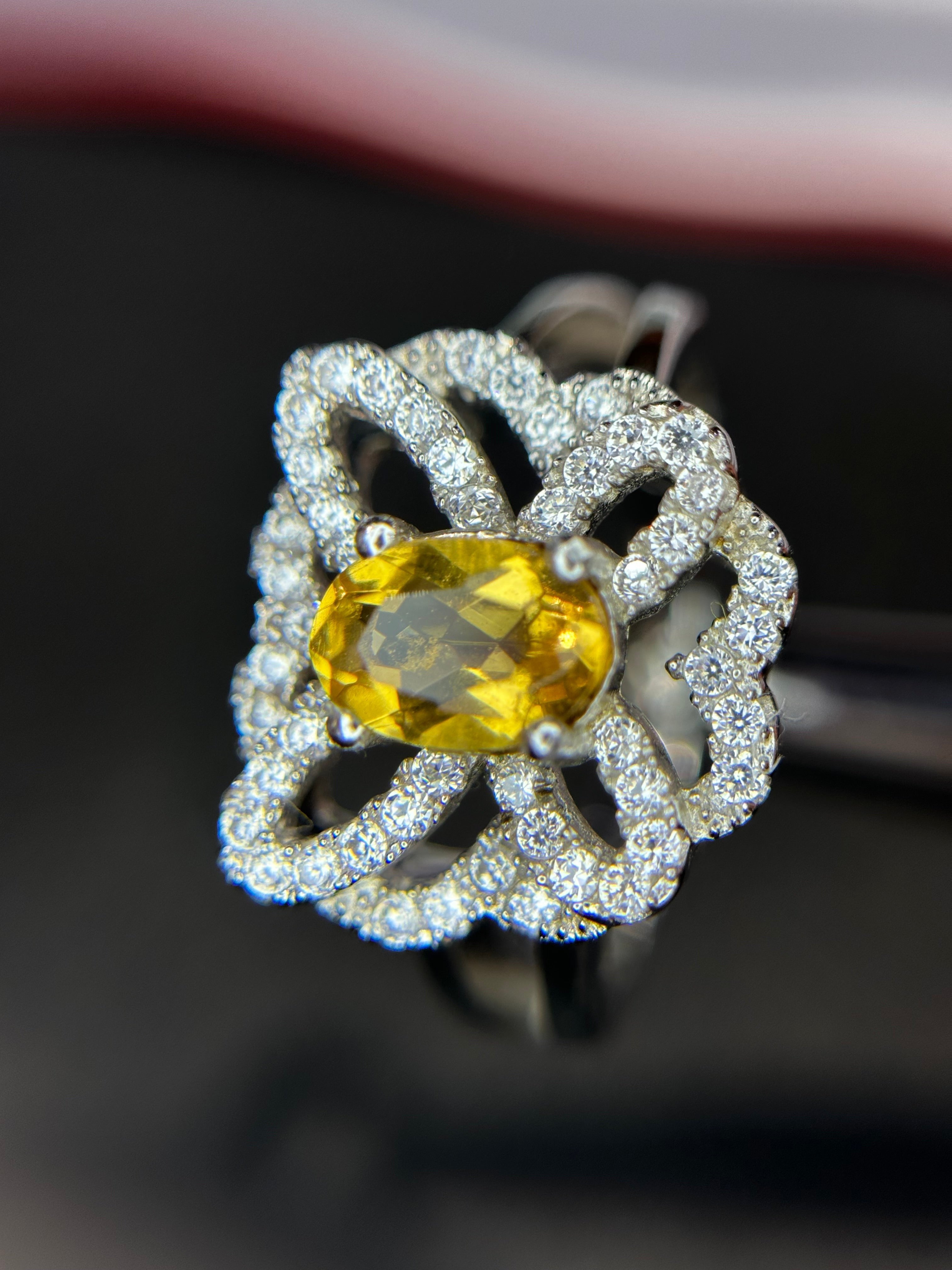 Shiza Gems oval golden yellow citrine ring with intricate woven pave CZ design in sterling silver.