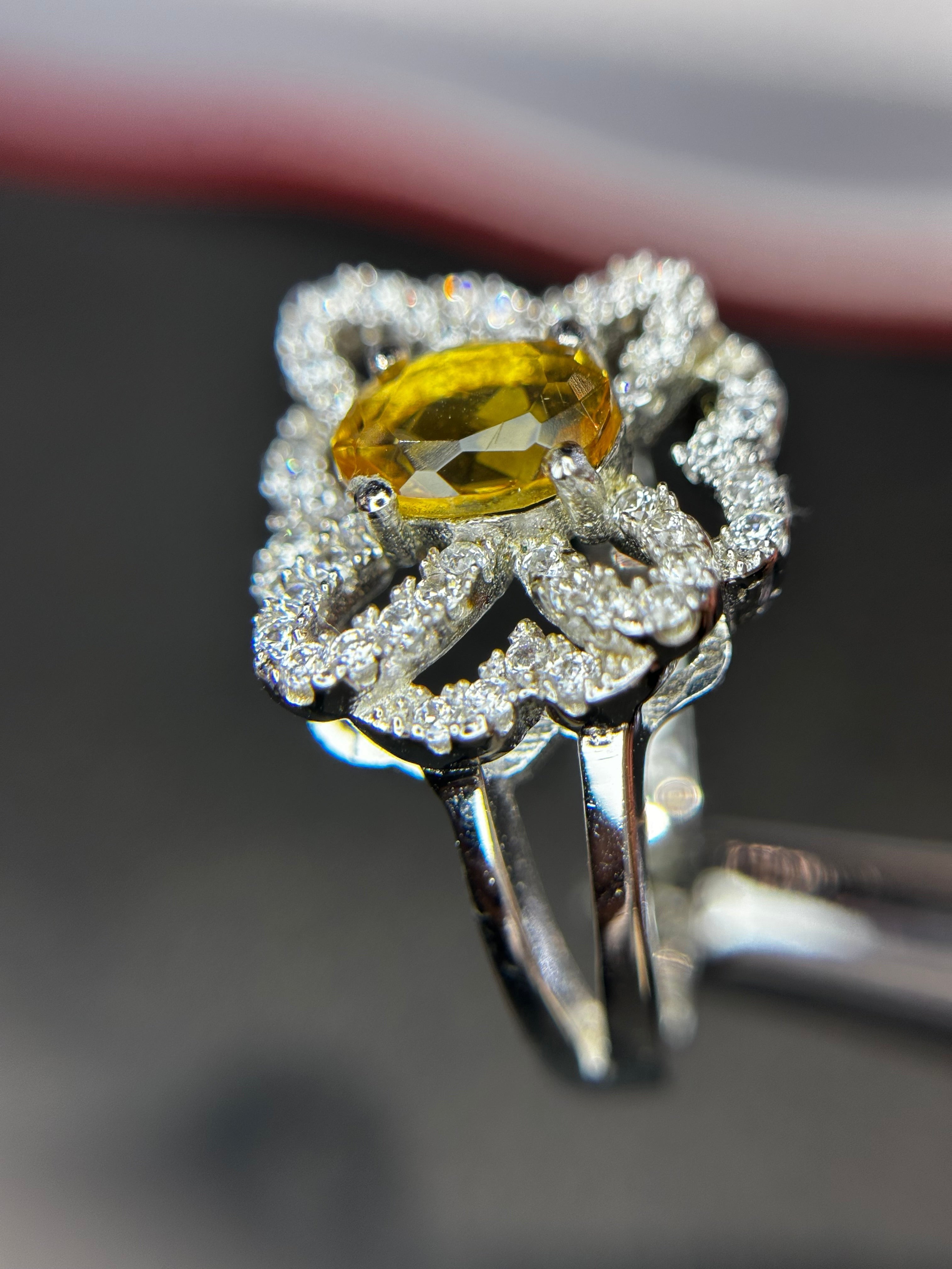 Shiza Gems oval golden citrine ring with intricate woven pave CZ design in sterling silver.