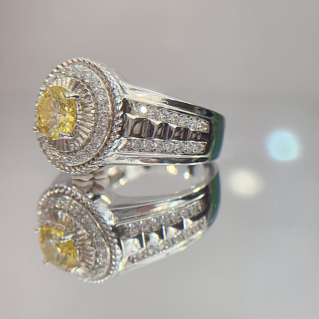 Shiza Gems men's sterling silver ring with round golden yellow moissanite, pavé halo, and green accents.
