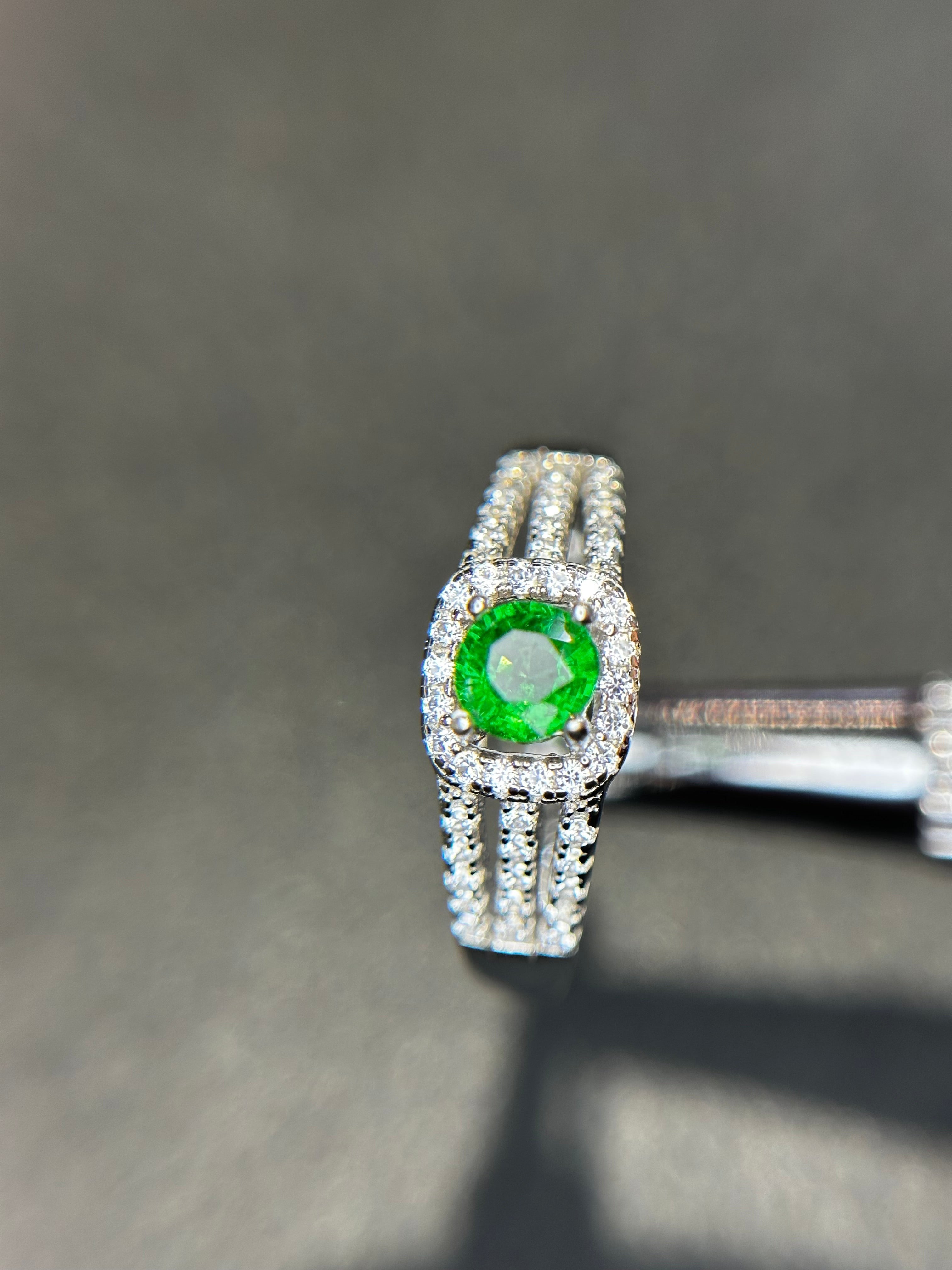 Shiza Gems round vivid green tsavorite garnet ring with square halo and split shank in sterling silver.