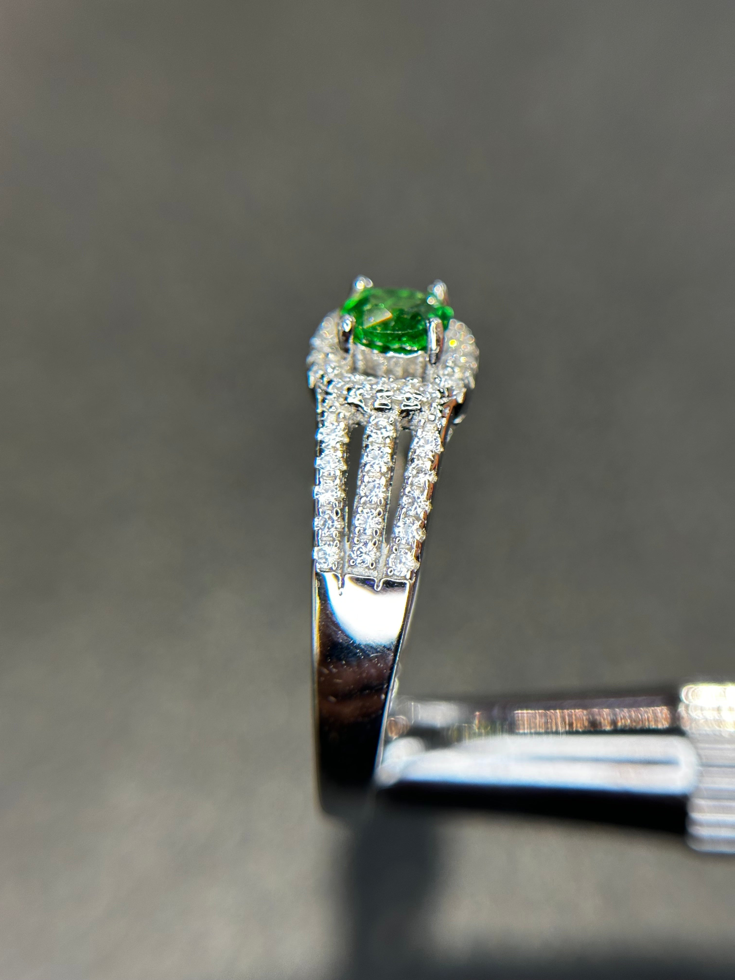 Shiza Gems round vivid green tsavorite garnet ring with square halo and split shank in sterling silver.