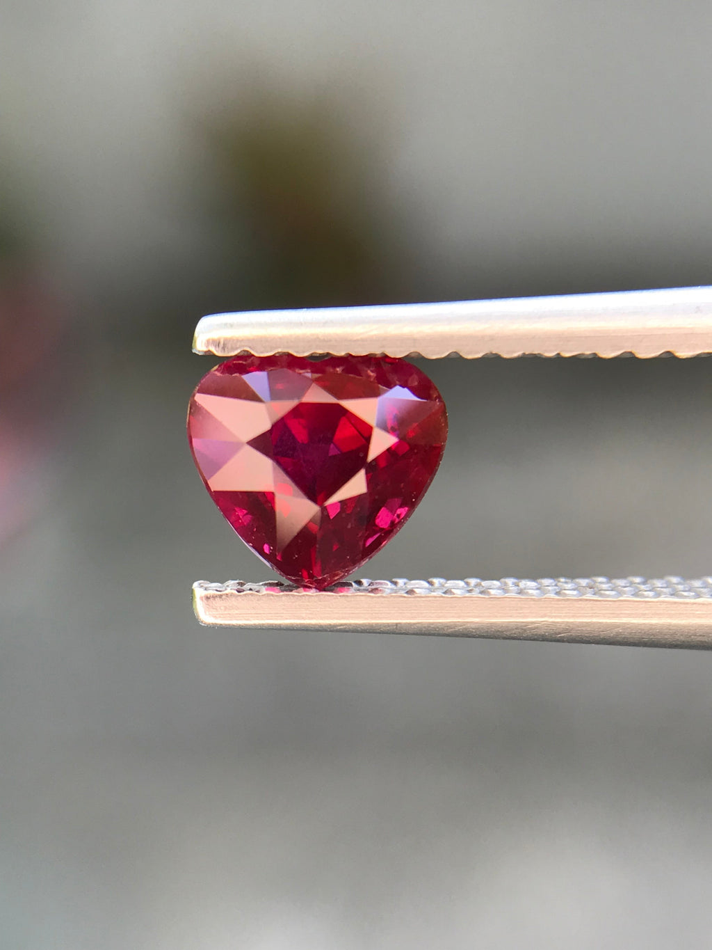 Shiza Gems 1.04 ct heart-cut vivid red unheated ruby gemstone from Mozambique.