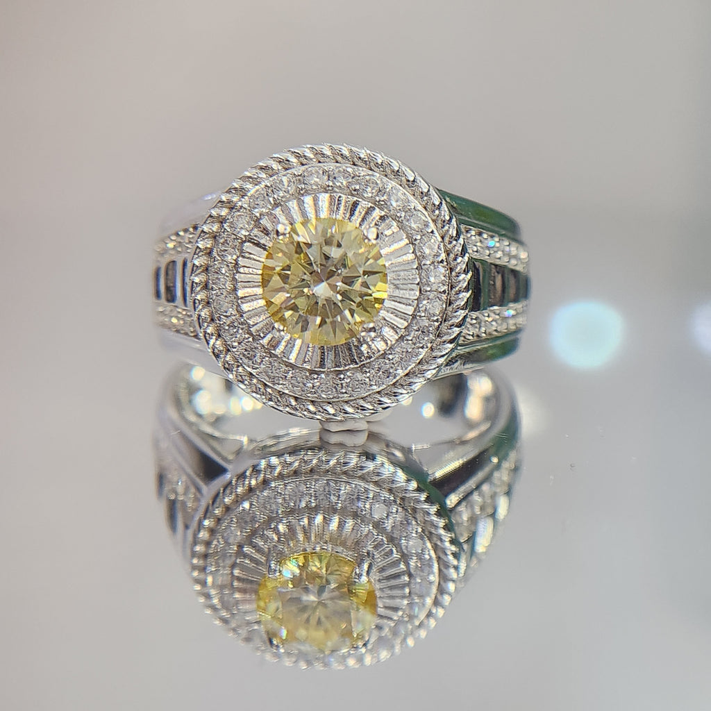 Shiza Gems men's sterling silver ring with round golden yellow moissanite, pavé halo, and green accents.