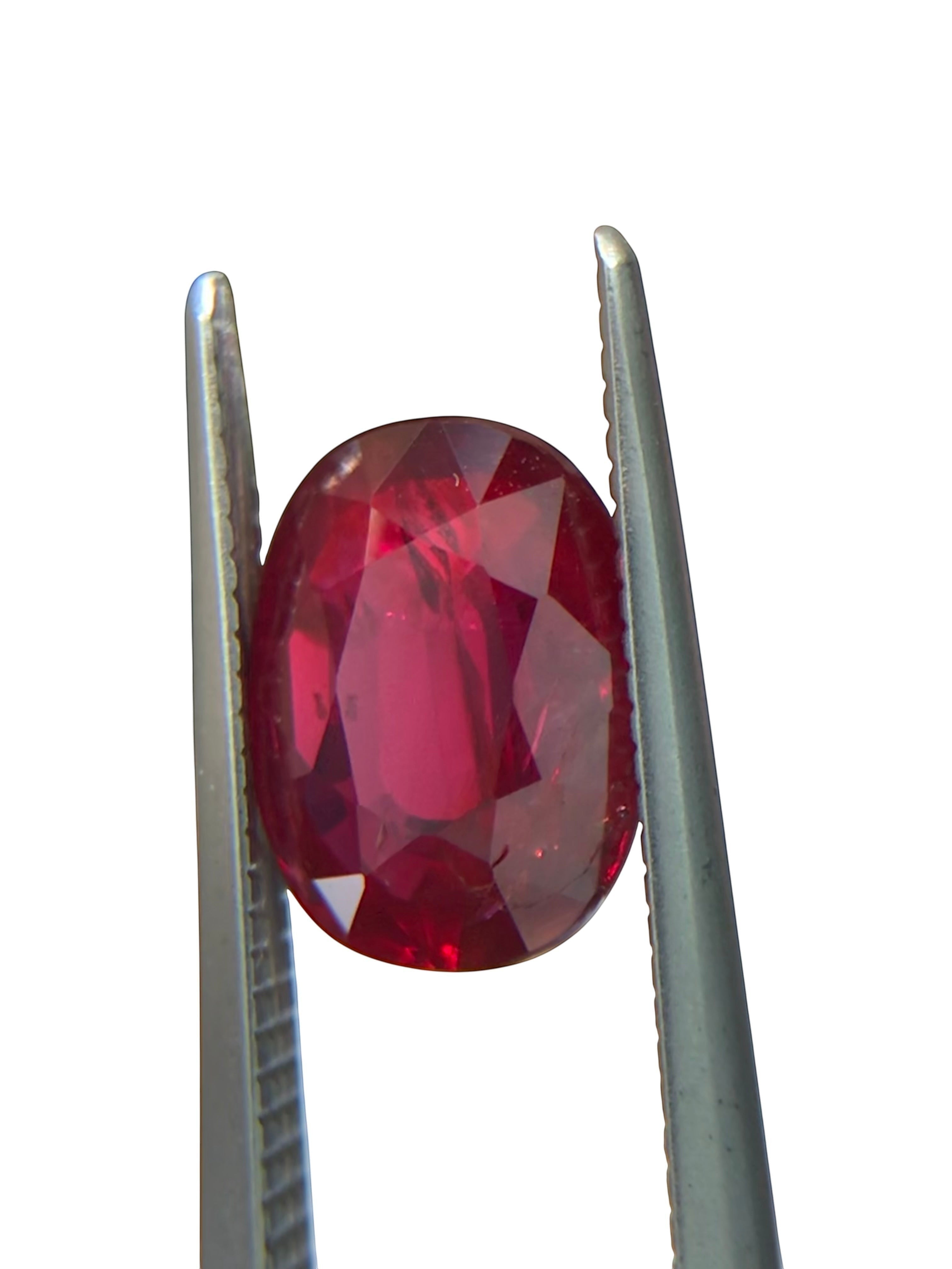 Shiza Gems 2.05 ct oval cut natural unheated pigeon blood ruby, vivid red color, AIGS certified loose gemstone.