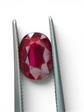 Shiza Gems 2.05 ct oval cut natural unheated pigeon blood ruby, vivid red color, AIGS certified loose gemstone.