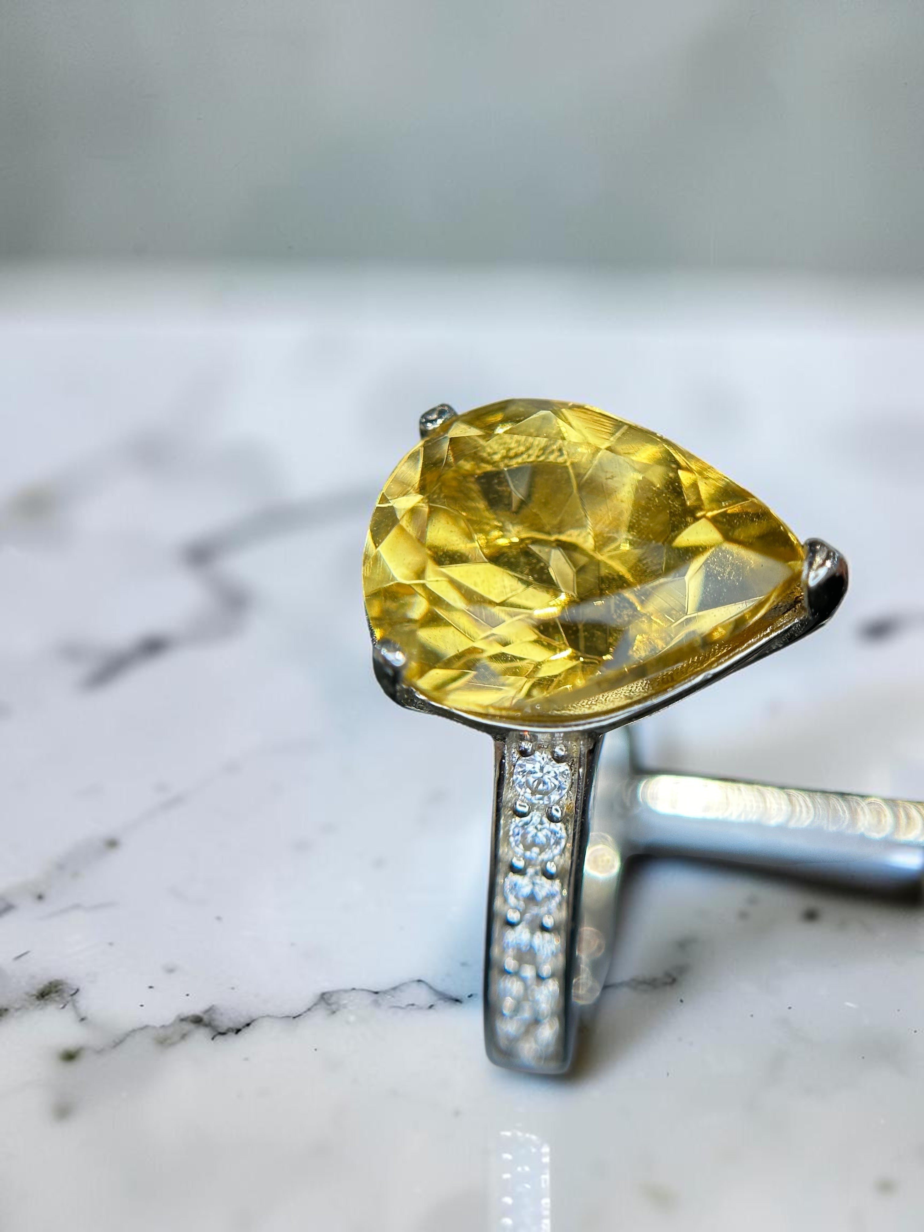 Shiza Gems large pear-cut golden yellow citrine ring with a sparkling pavé band in sterling silver.
