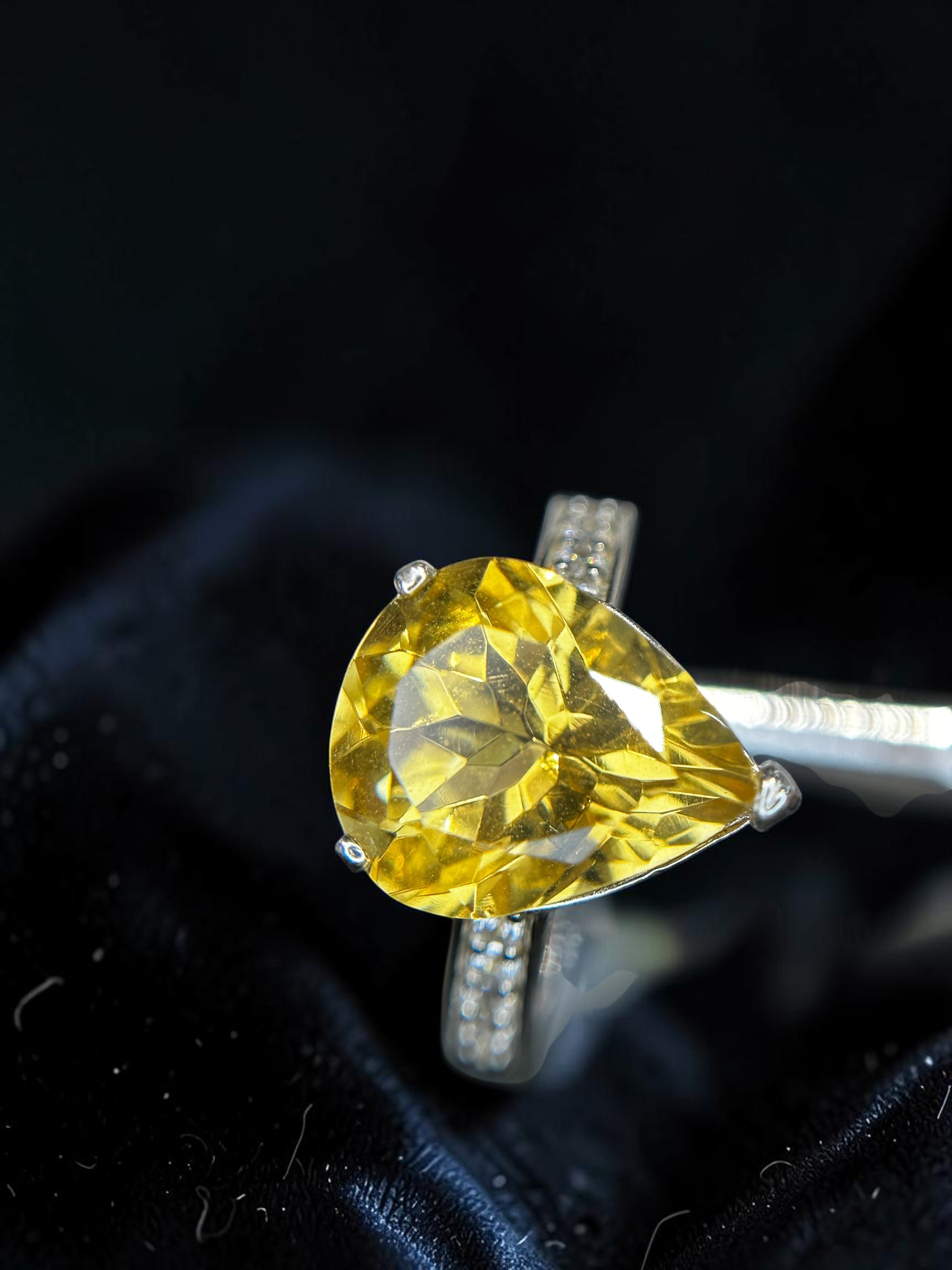Shiza Gems large pear-cut golden yellow citrine ring with sparkling pavé band in sterling silver.