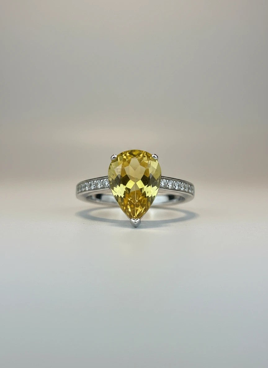 Shiza Gems large pear-cut golden yellow citrine ring with sparkling pavé band in sterling silver.