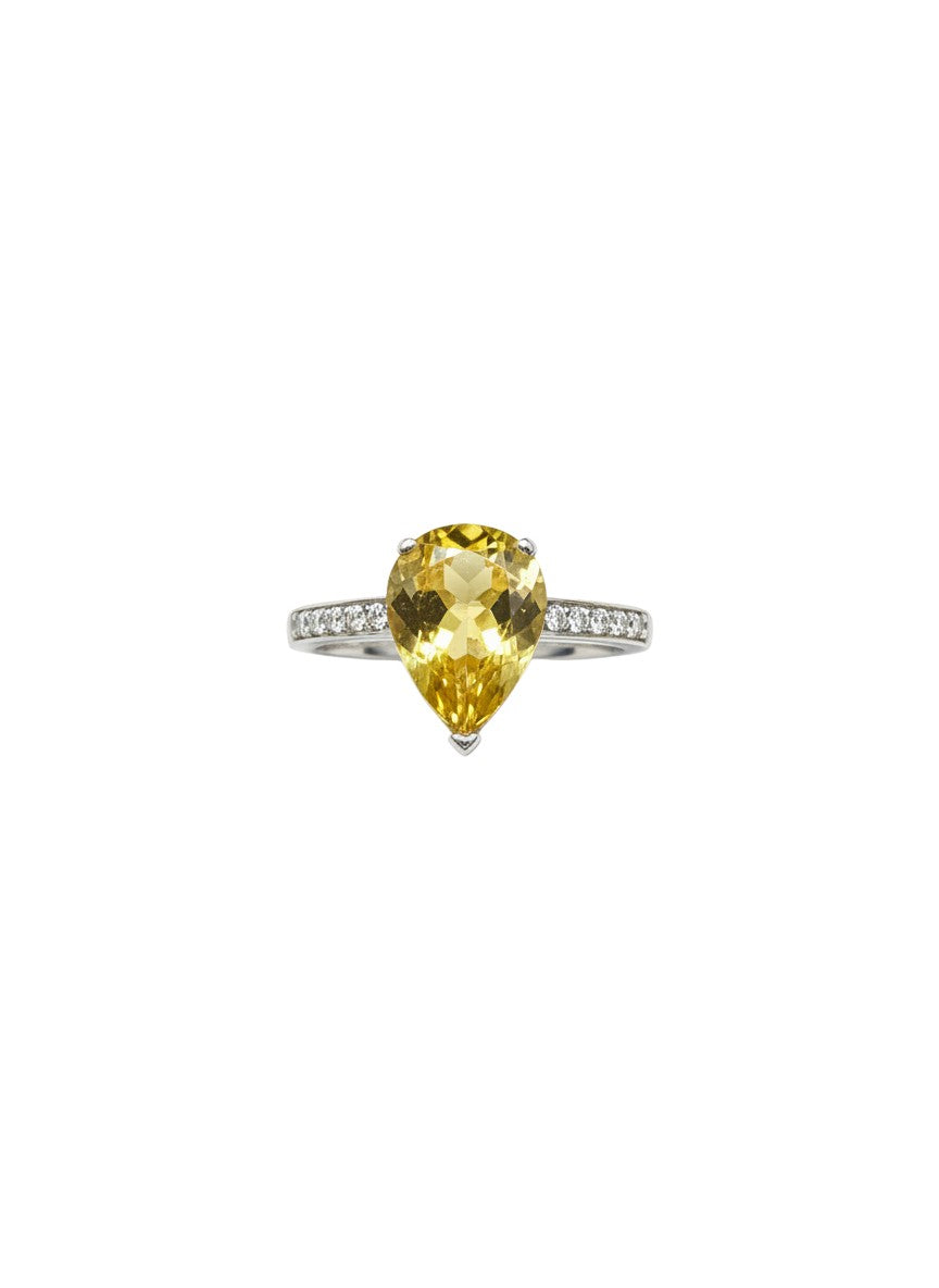 Shiza Gems pear-cut yellow gemstone ring with pavé diamond band in silver.