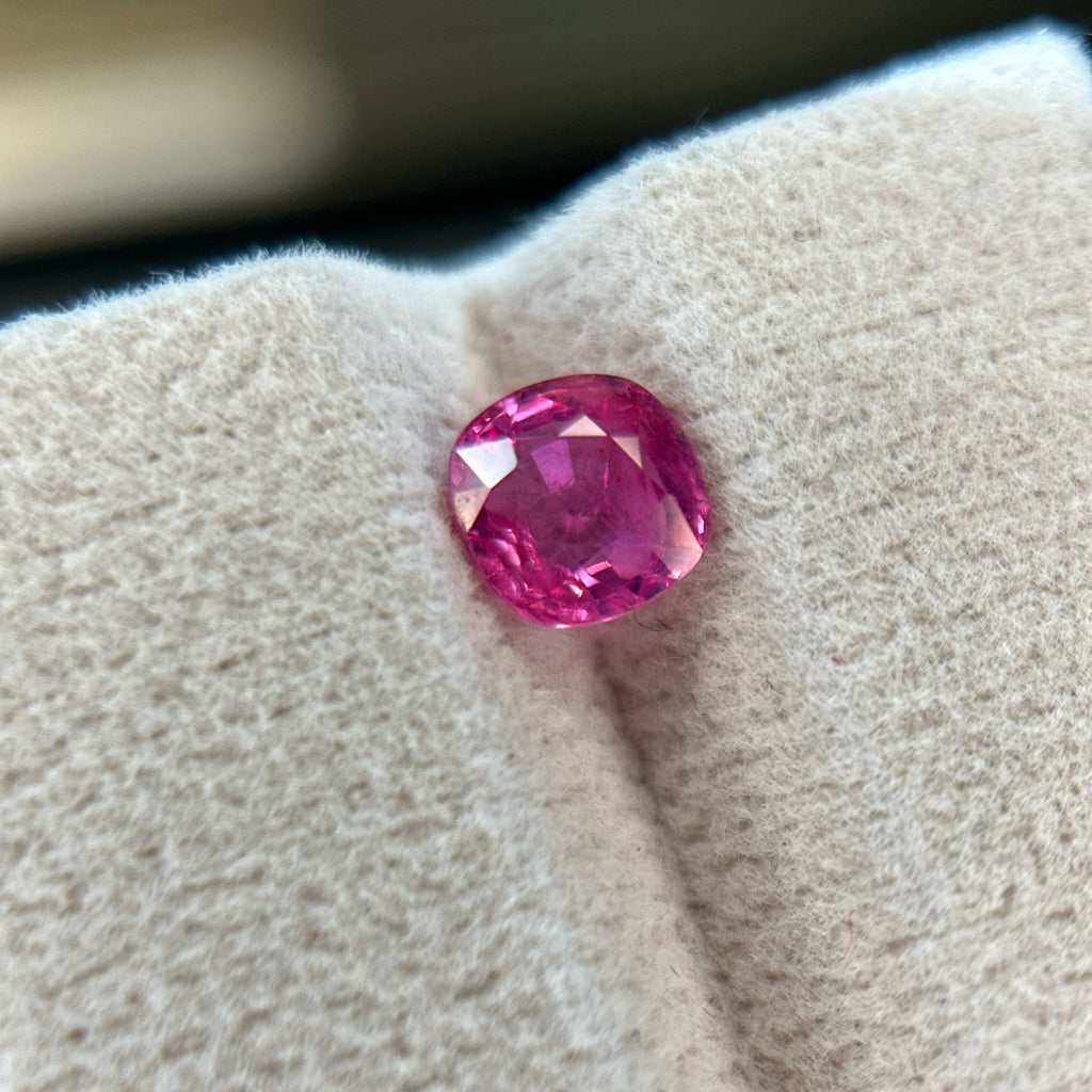 Shiza Gems 1.20 ct cushion cut vivid pink unheated natural sapphire gemstone.