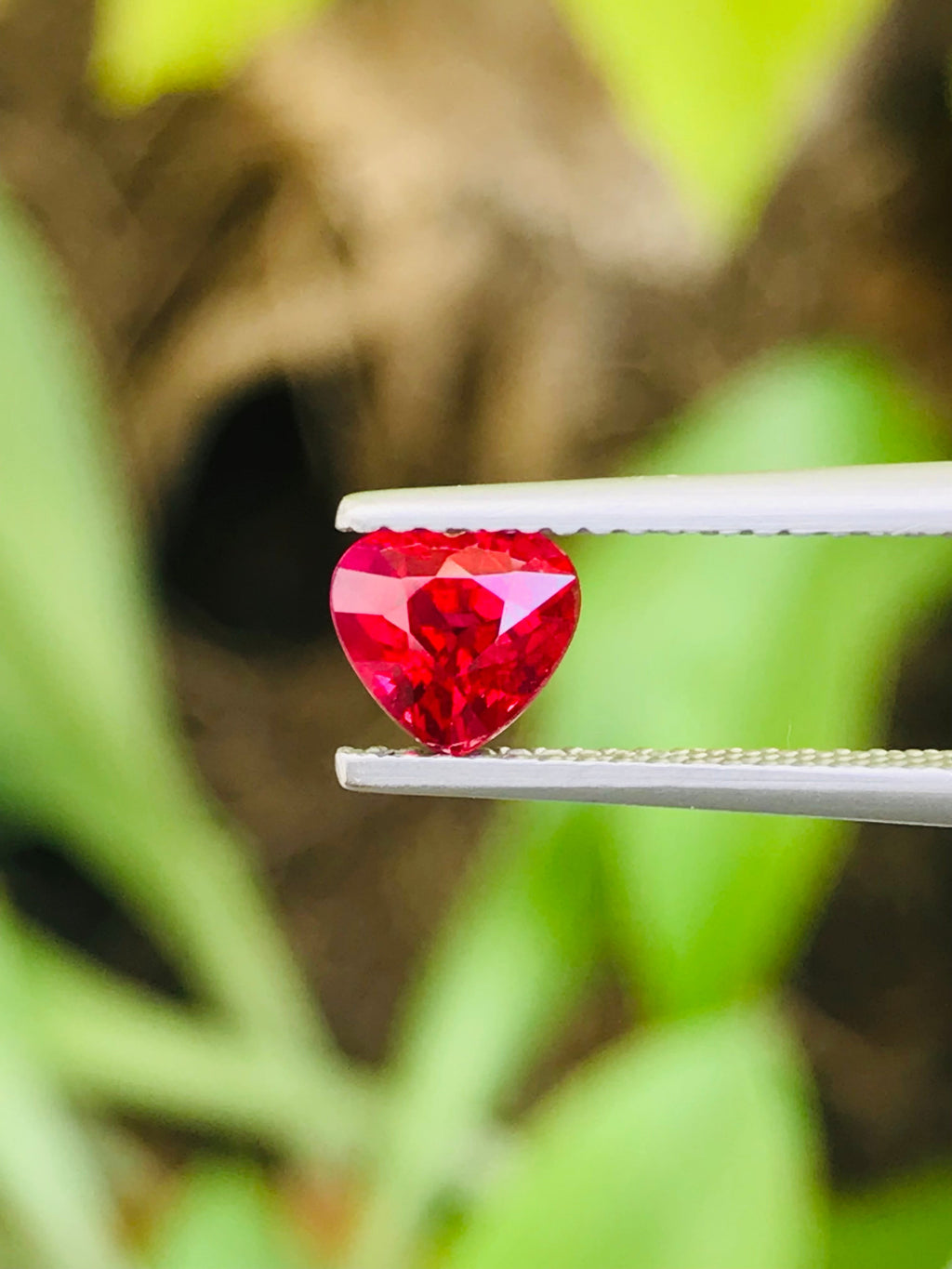 Shiza Gems 1.04 ct vivid red heart-cut unheated ruby from Mozambique, perfect for romantic jewelry.