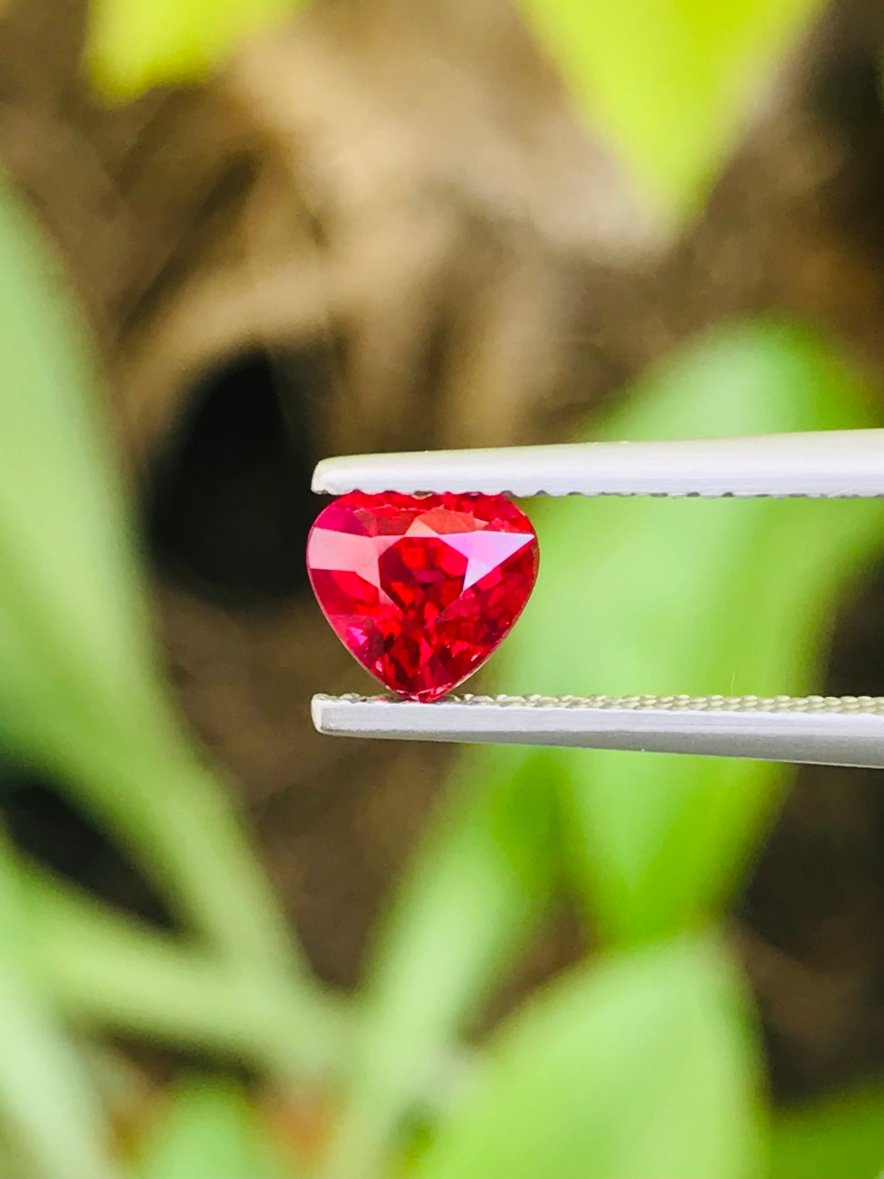 Shiza Gems 1.04 ct vivid red heart-cut unheated ruby from Mozambique, perfect for romantic jewelry.