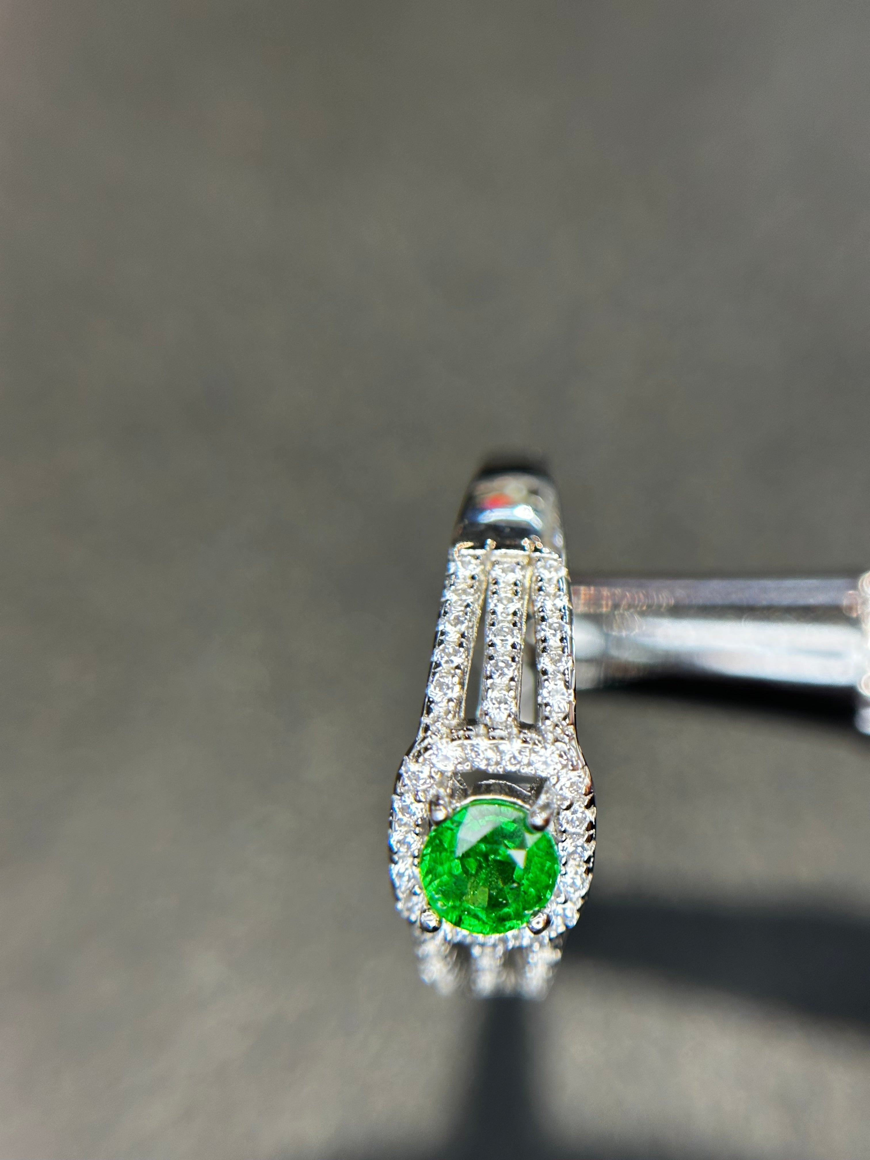 Shiza Gems round vivid green tsavorite garnet ring with square halo and split shank in sterling silver.