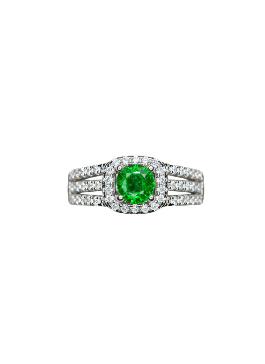 Shiza Gems Tsavorite silver ring with a square halo of small diamonds surrounding a round green tsavorite gemstone.